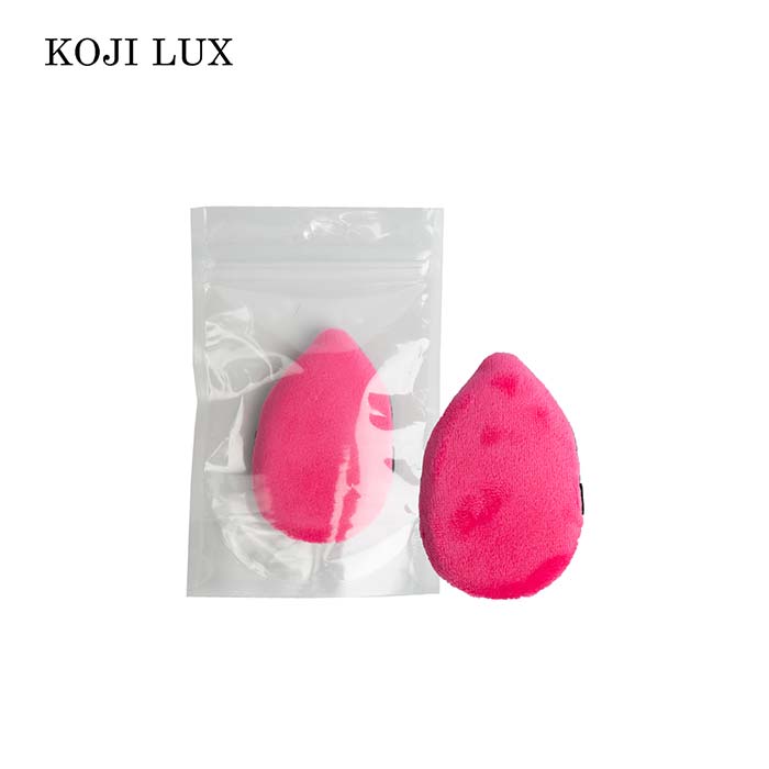 Pink egg-shaped powder puff